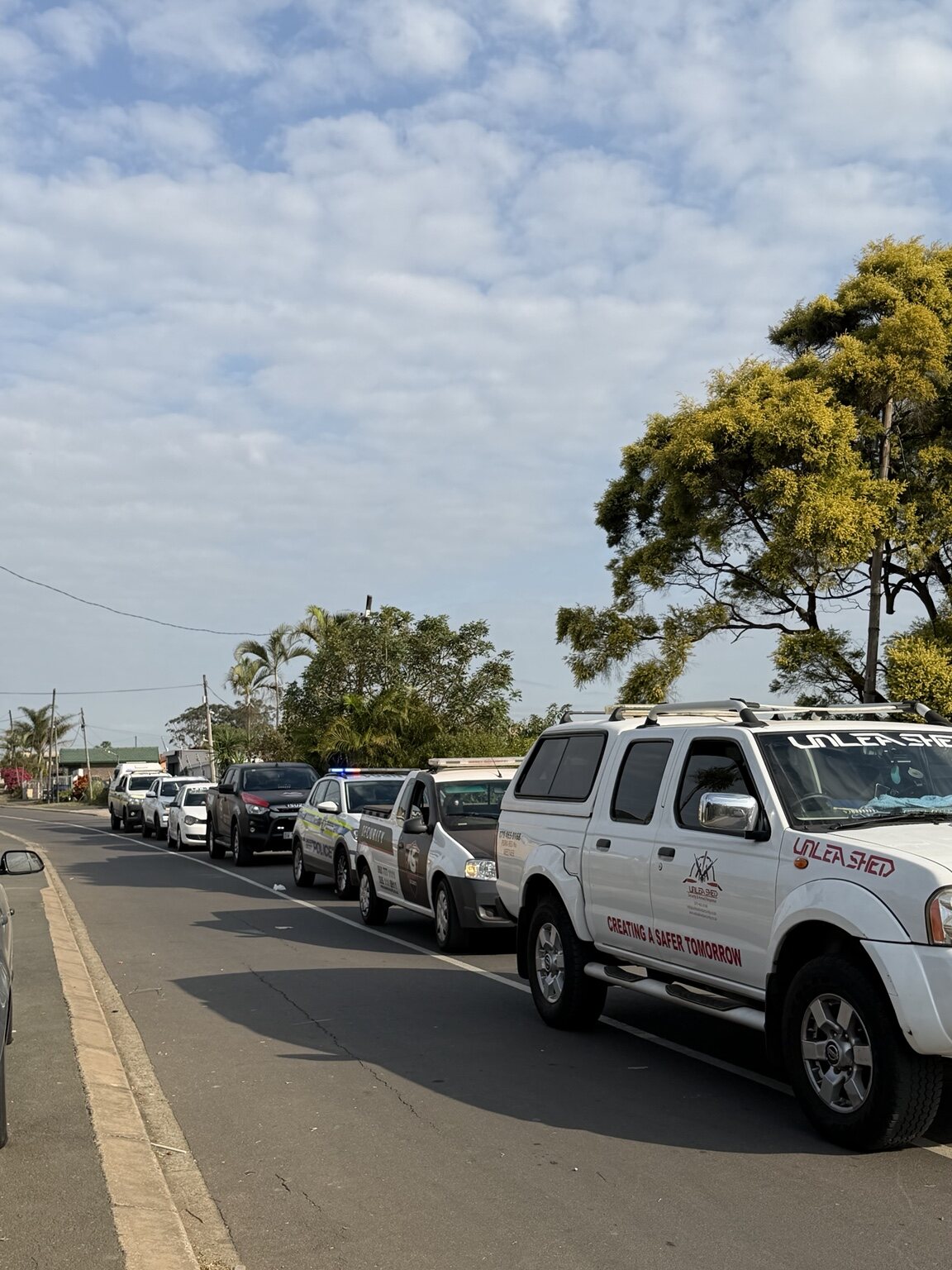 Unleashed Security marked vehicles lined up during operations